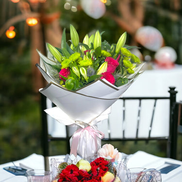 Mixed Floral Delight, Lilies, Hot Pink Roses, Chrysanthemum, Eryngium